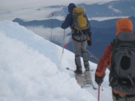Crossing a crevasse on a ladder